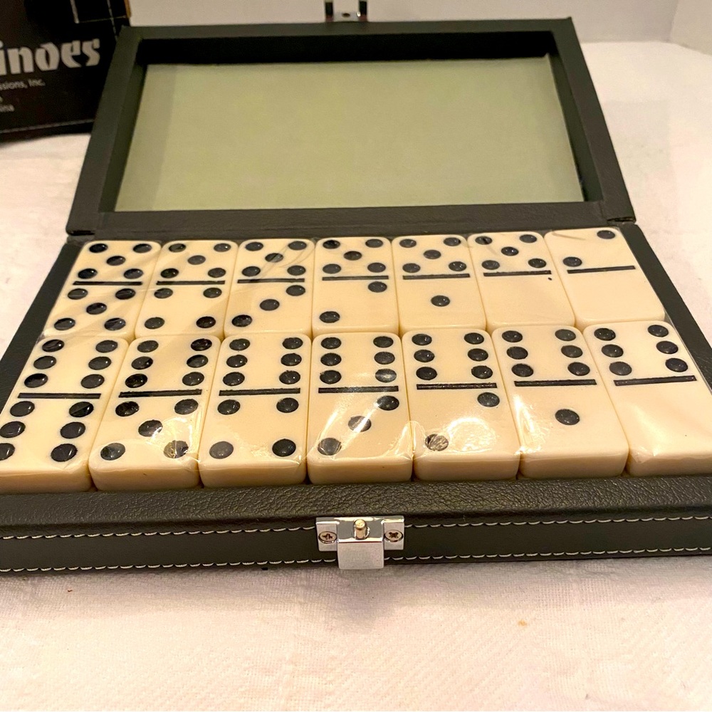 Dominoes sealed in case. Deluxe case. 2-4 players